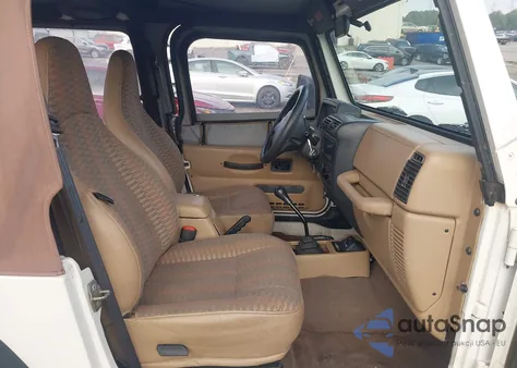 1999 Jeep Wrangler Sport z USA, uszkodzony, nr VIN 1J4FY19S1XP413327